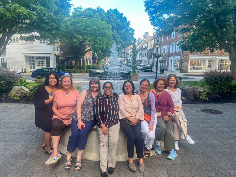 In front of the fountain